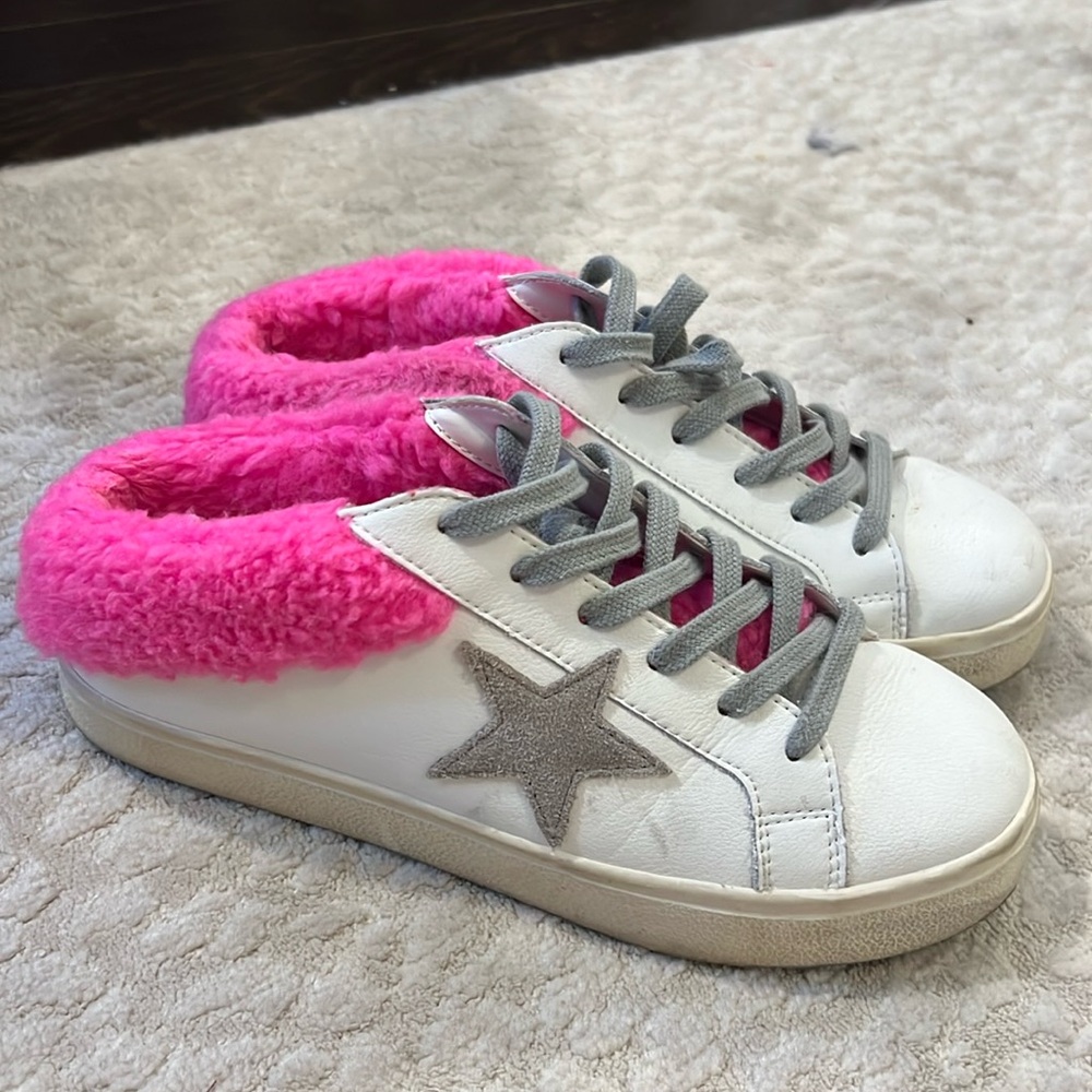 Steve Madden star faux fur slide sneakers.